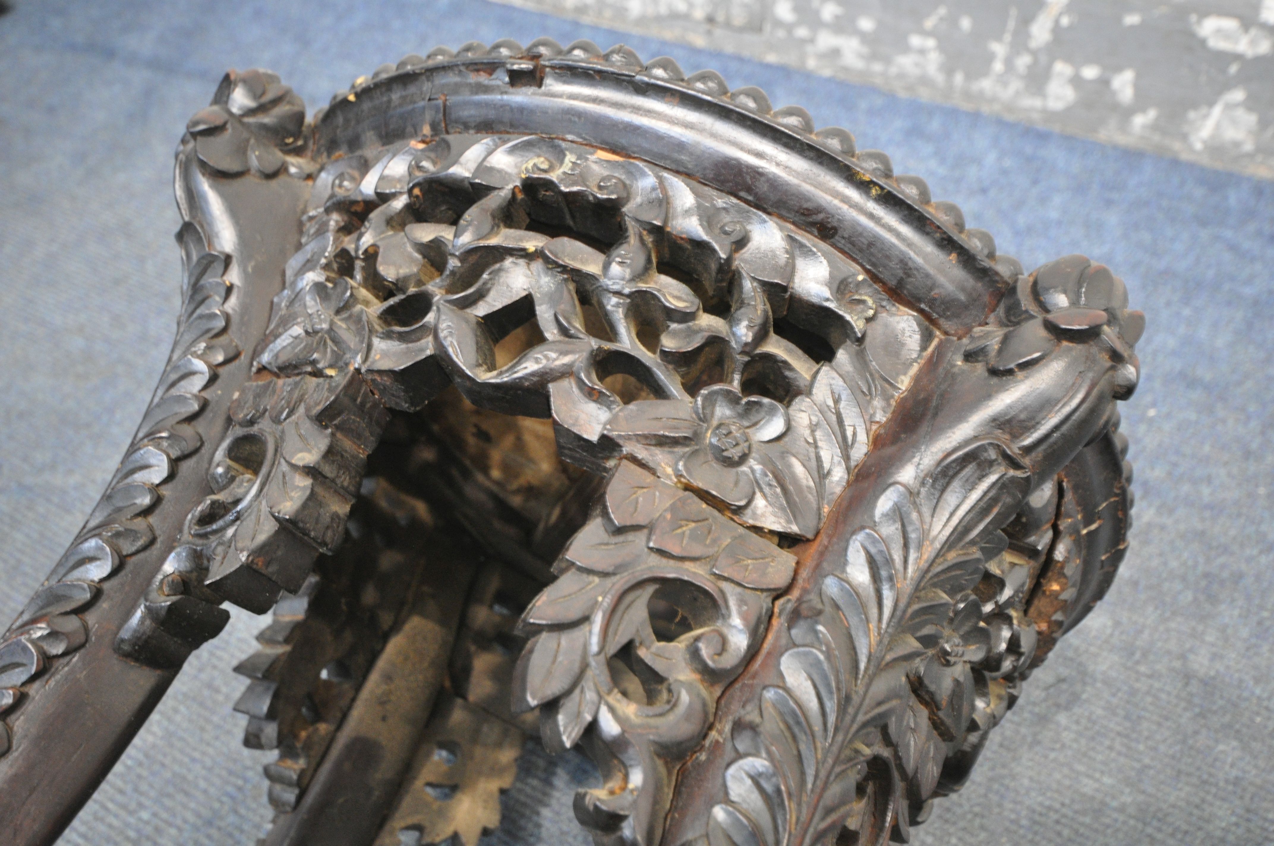 AN INTRICATLY CARVED CIRCULAR CHINESE ROSEWOOD SIDE TABLE, with a veined marble insert, the four - Image 7 of 8