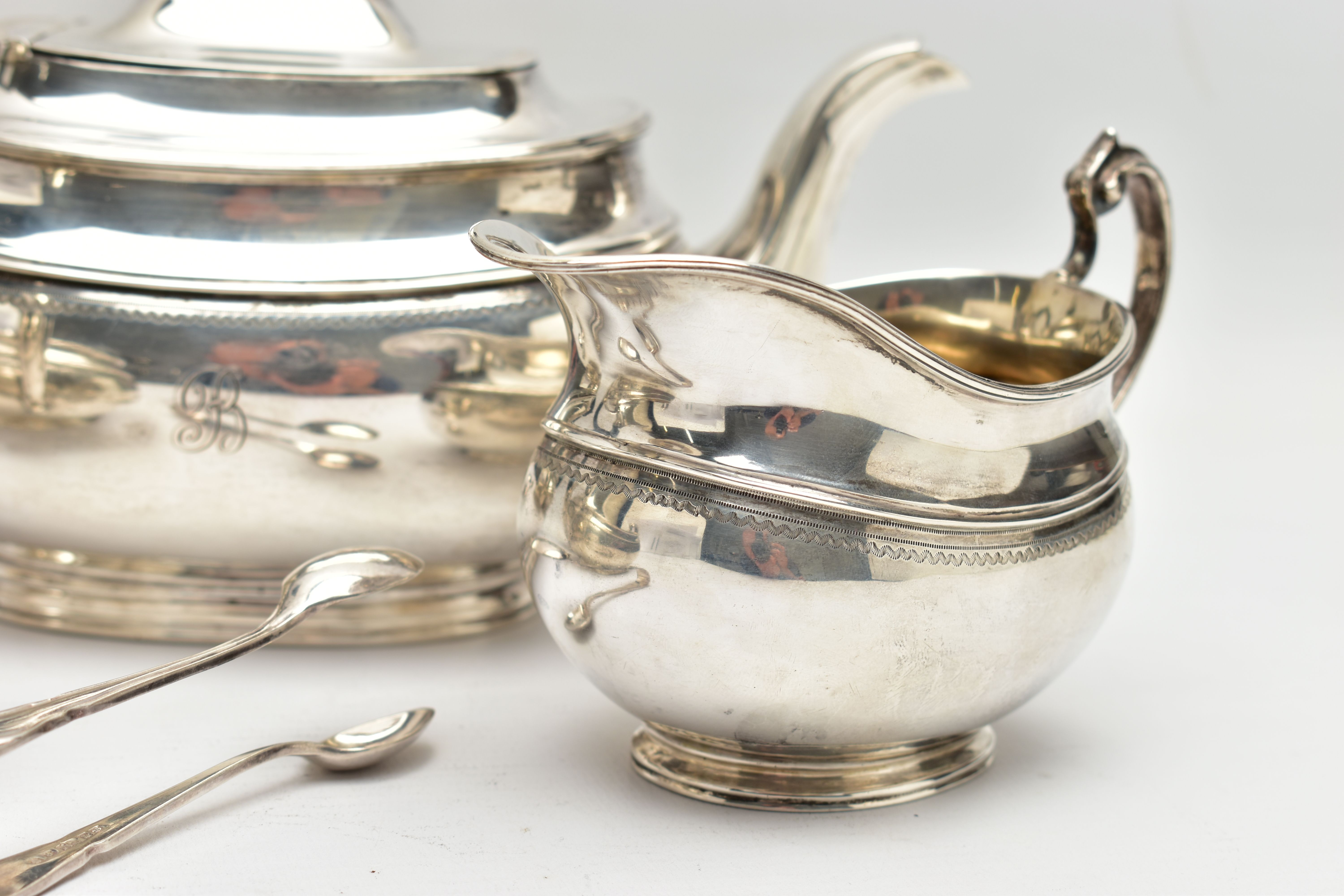 A GEORGE V SILVER FOUR PIECE TEA SERVICE OF OVAL FORM, comprising tea pot, hot water/coffee jug, - Image 4 of 9