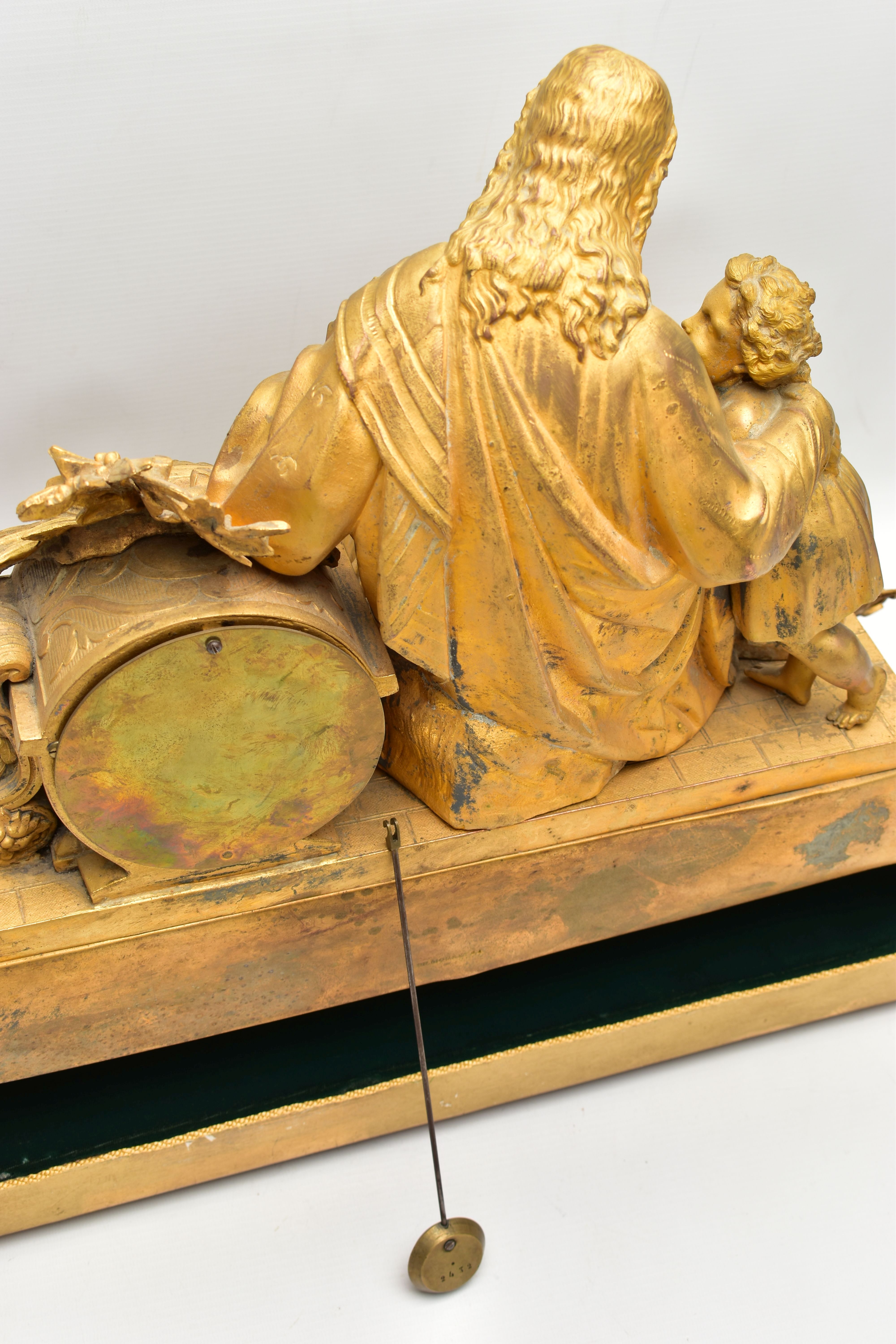 A MID 19TH CENTURY GILT METAL MANTEL CLOCK, cast with a seated figure of Christ and two children, - Image 10 of 11