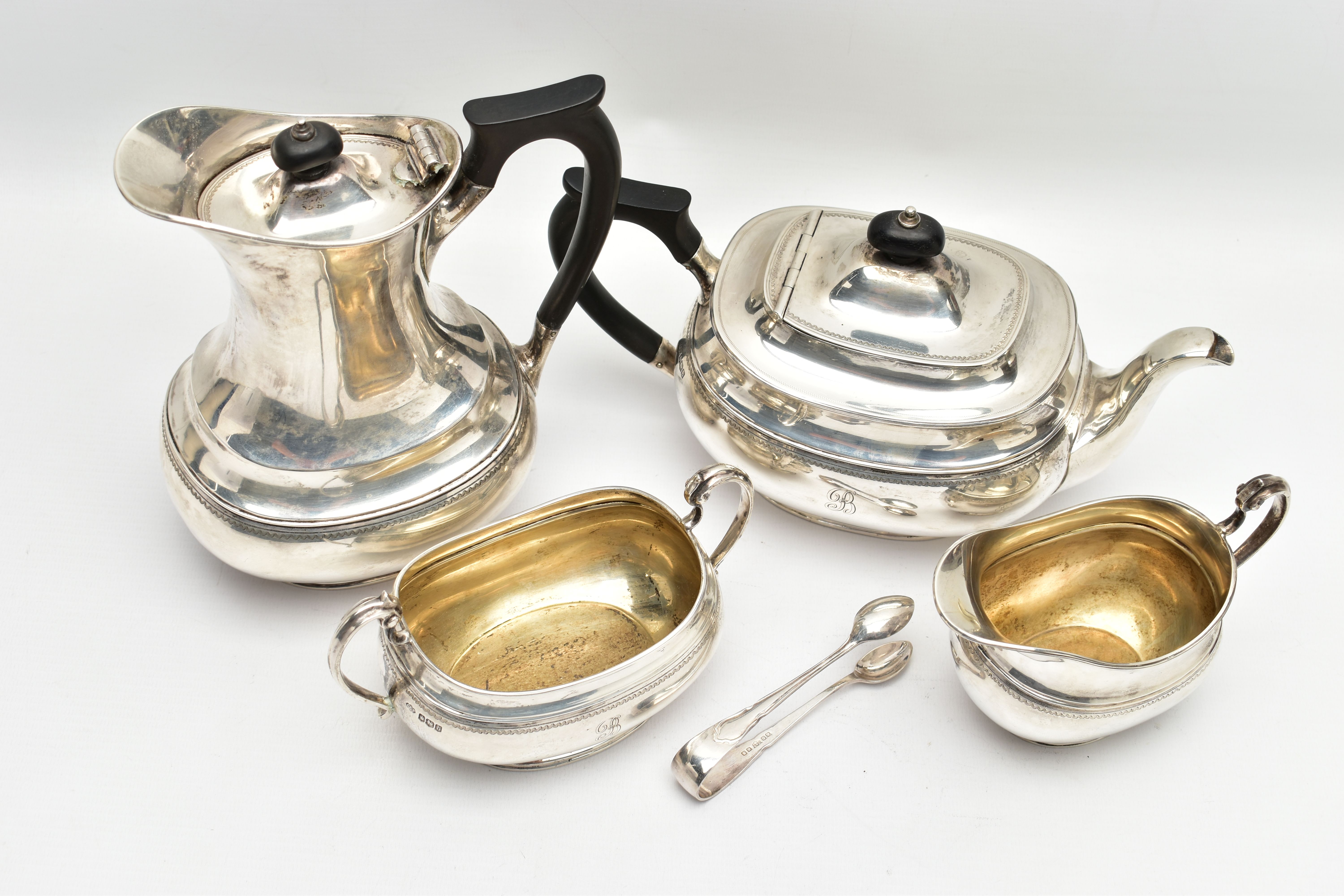 A GEORGE V SILVER FOUR PIECE TEA SERVICE OF OVAL FORM, comprising tea pot, hot water/coffee jug, - Image 2 of 9