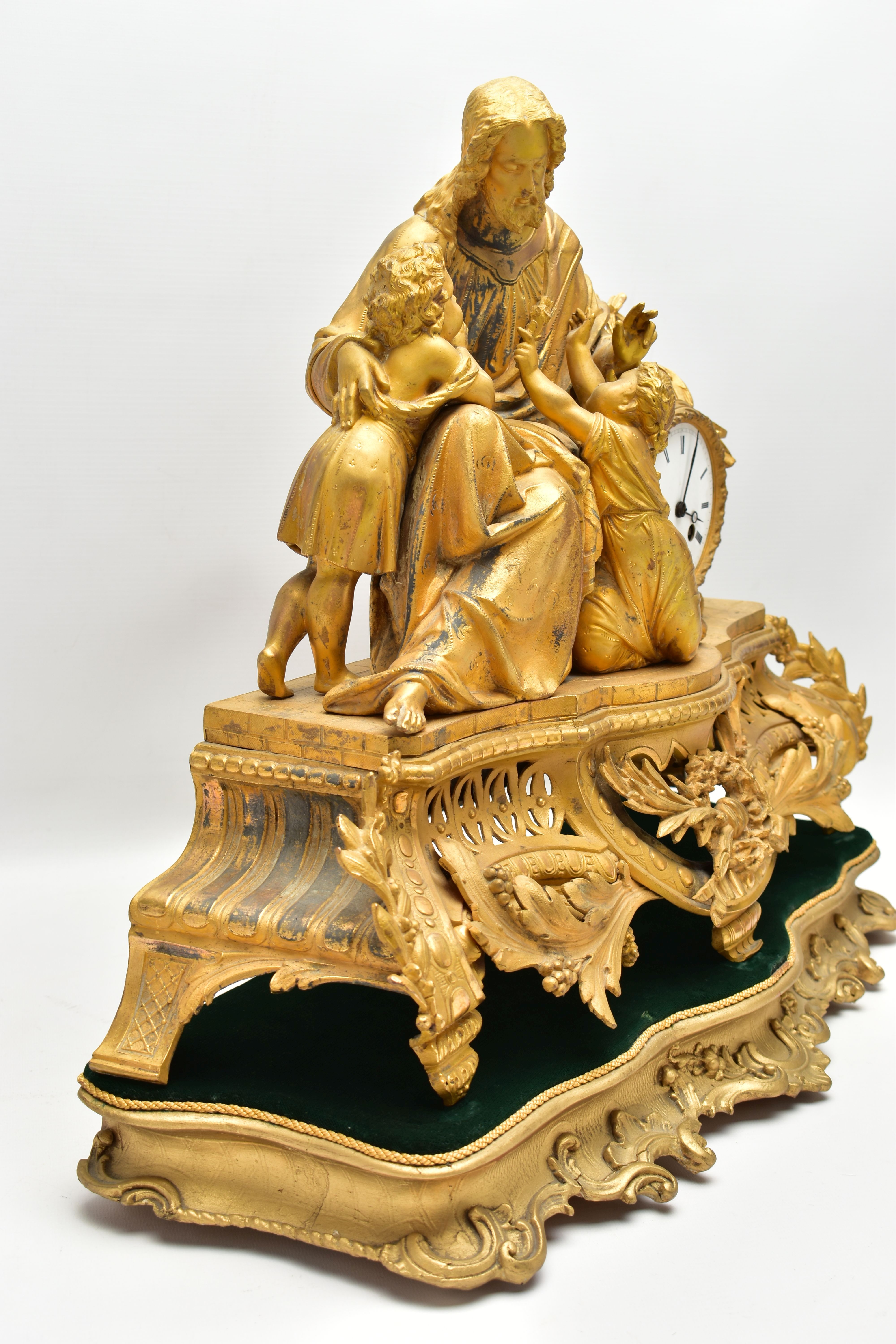 A MID 19TH CENTURY GILT METAL MANTEL CLOCK, cast with a seated figure of Christ and two children, - Image 6 of 11