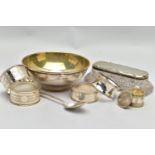 AN ELIZABETH II SILVER CIRCULAR BOWL, FOUR SILVER NAPKIN RINGS, ETC, the bowl with gilt interior,