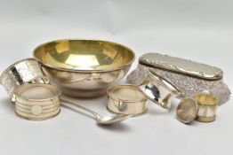 AN ELIZABETH II SILVER CIRCULAR BOWL, FOUR SILVER NAPKIN RINGS, ETC, the bowl with gilt interior,