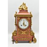 A MID 19TH CENTURY FRENCH RED MARBLE AND ORMOLU MANTEL CLOCK, the stepped rectangular top with