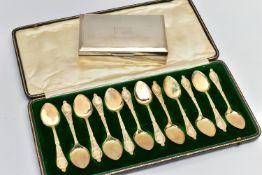 A CASED SET OF TWELVE LATE VICTORIAN SILVER GILT ICE CREAM SPOONS, foliate decoration to the