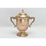 A GEORGE V SILVER TWIN HANDLED TROPHY CUP AND COVER, the pull off domed cover with foliate ball