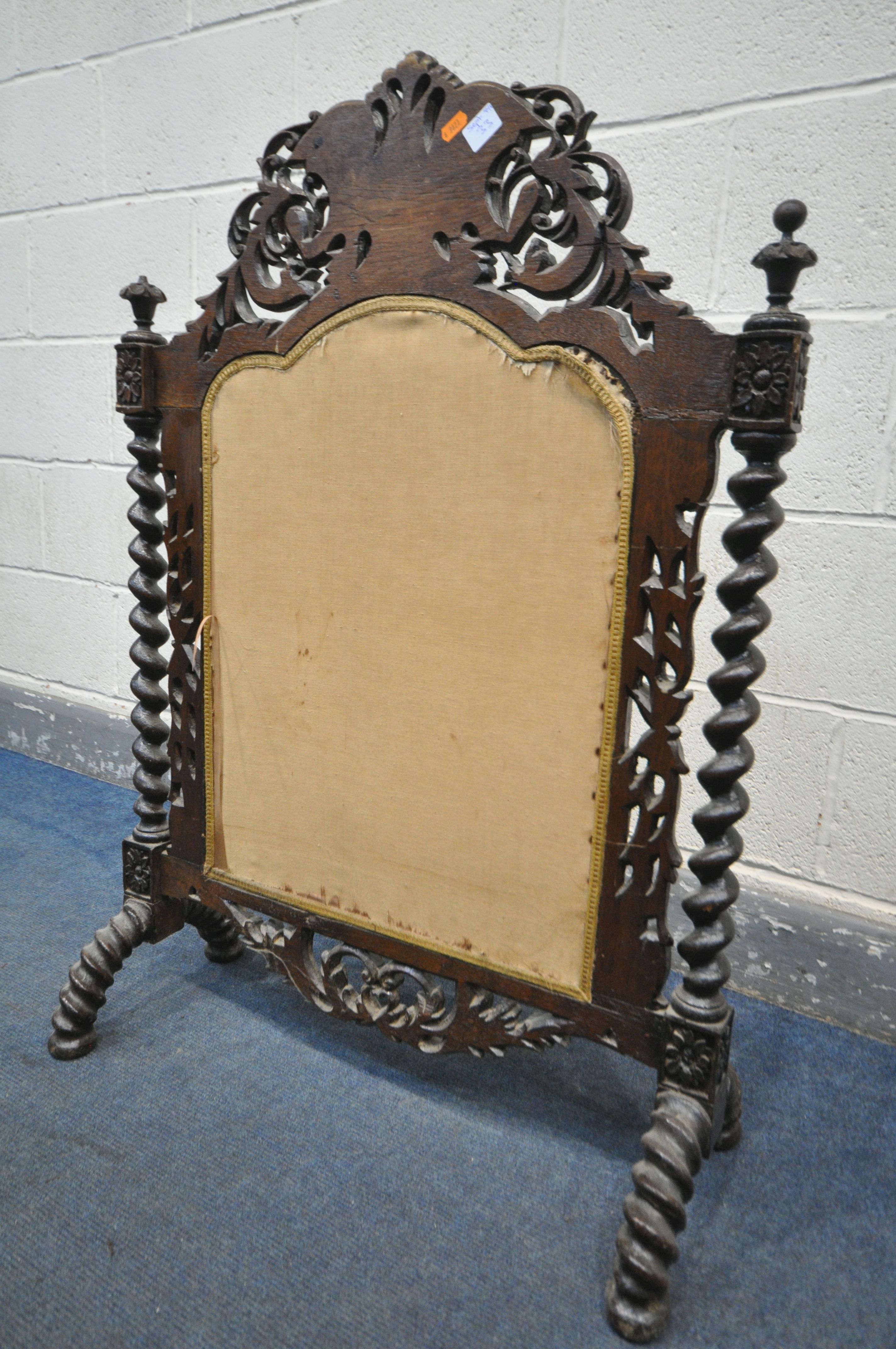 A VICTORIAN CARVED OAK FIRESCREEN, the detailed foliate decorated frame, central lettering reading - Image 5 of 6