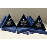 THREE BOXED SWAROVSKI ANNUAL CHRISTMAS ORNAMENTS 2005, 2006 AND 2007 (680502, 837613 and 872200),