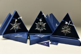 THREE BOXED SWAROVSKI ANNUAL CHRISTMAS ORNAMENTS 2005, 2006 AND 2007 (680502, 837613 and 872200),