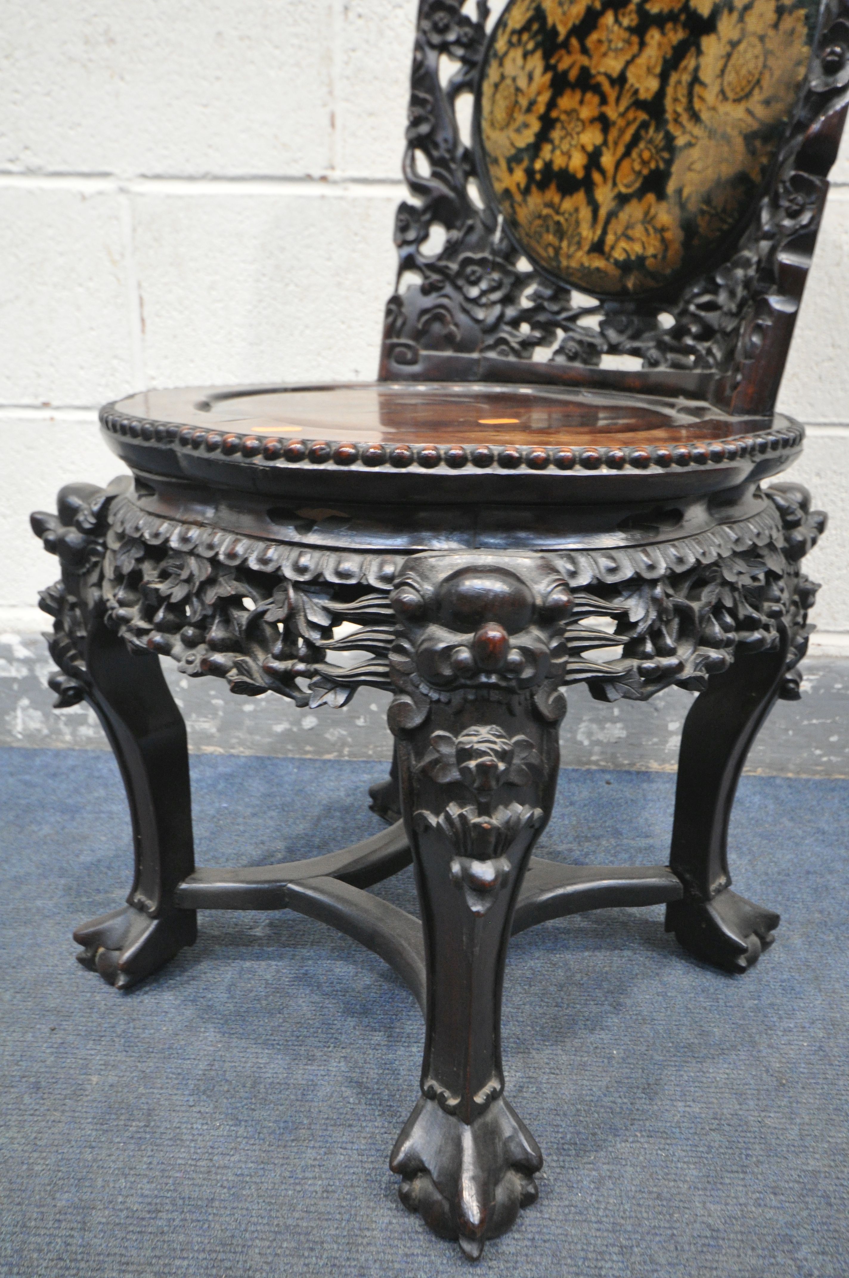 AN INTRICATLY CARVED CHINESE HARDWOODCHAIR, late 19th/early 20th century, flower heads and vines - Image 6 of 10