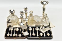 A SELECTION OF SILVER ITEMS, comprising a set of six tea spoons with scroll engraved detail,