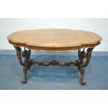 A VICTORIAN BURR WALNUT CENTRE TABLE, the oval serpentine top being quarter veneered, on a base with