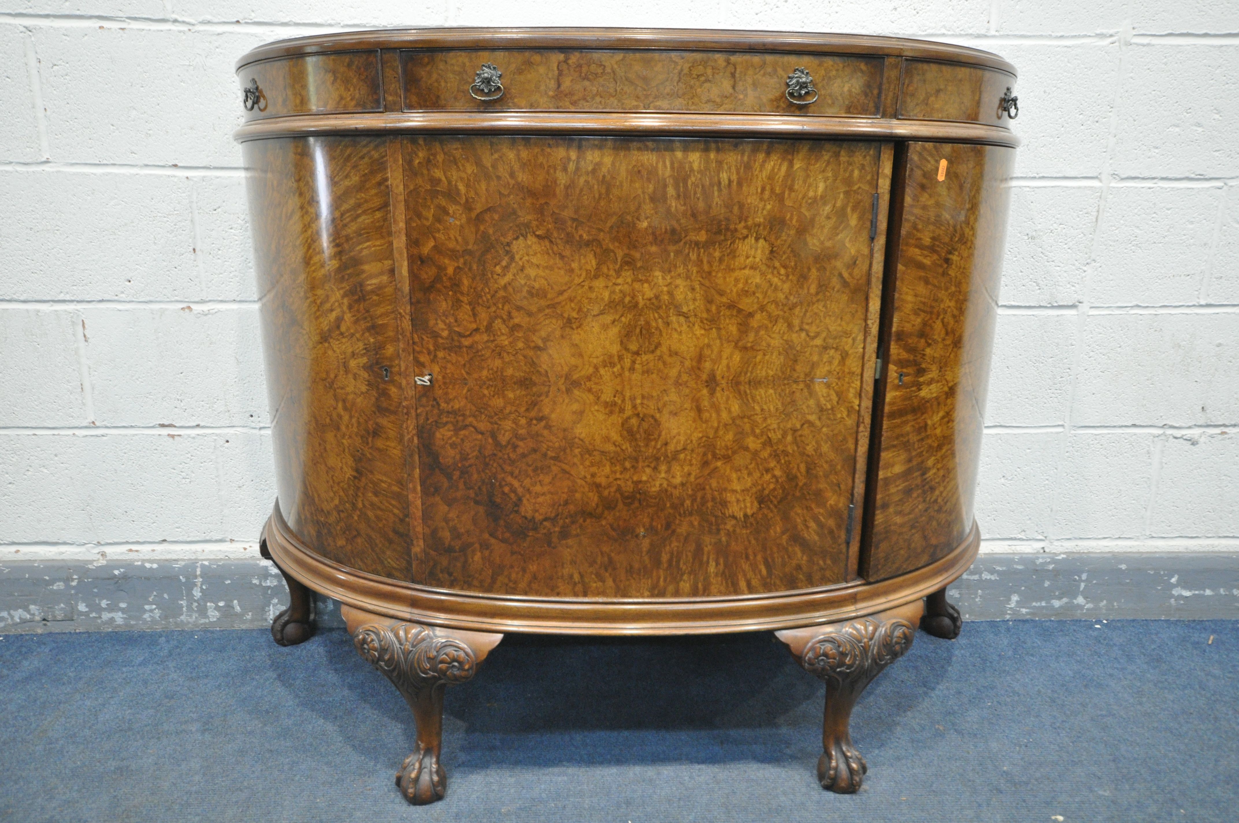 AN EARLY TO MID 20TH CENTURY MAPLE AND CO BURR WALNUT DEMI LUNE SIDE CABINET, with three frieze - Bild 3 aus 6