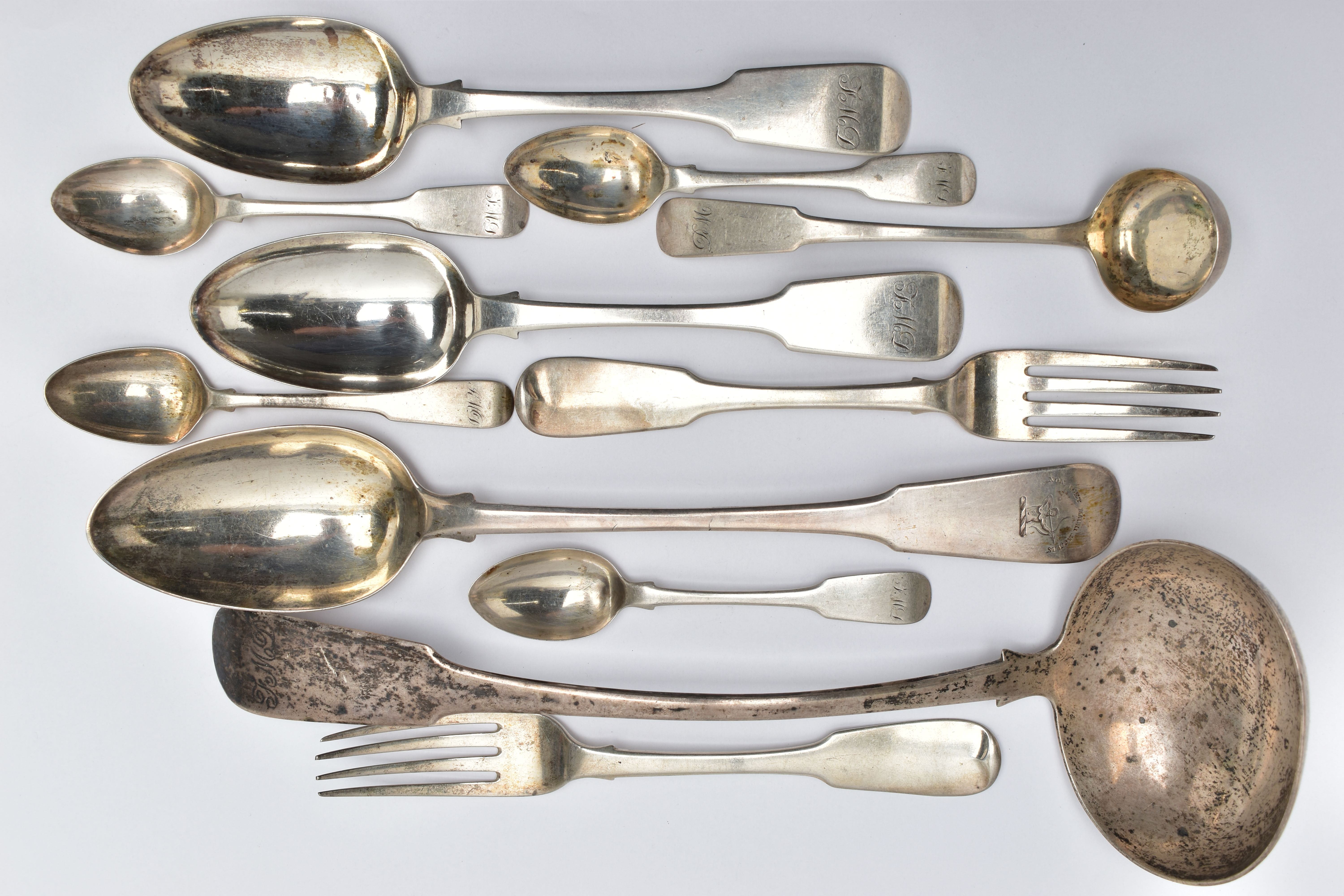 ELEVEN PIECES OF 19TH CENTURY SCOTTISH SILVER FLATWARE, comprising a soup ladle, two tablespoon