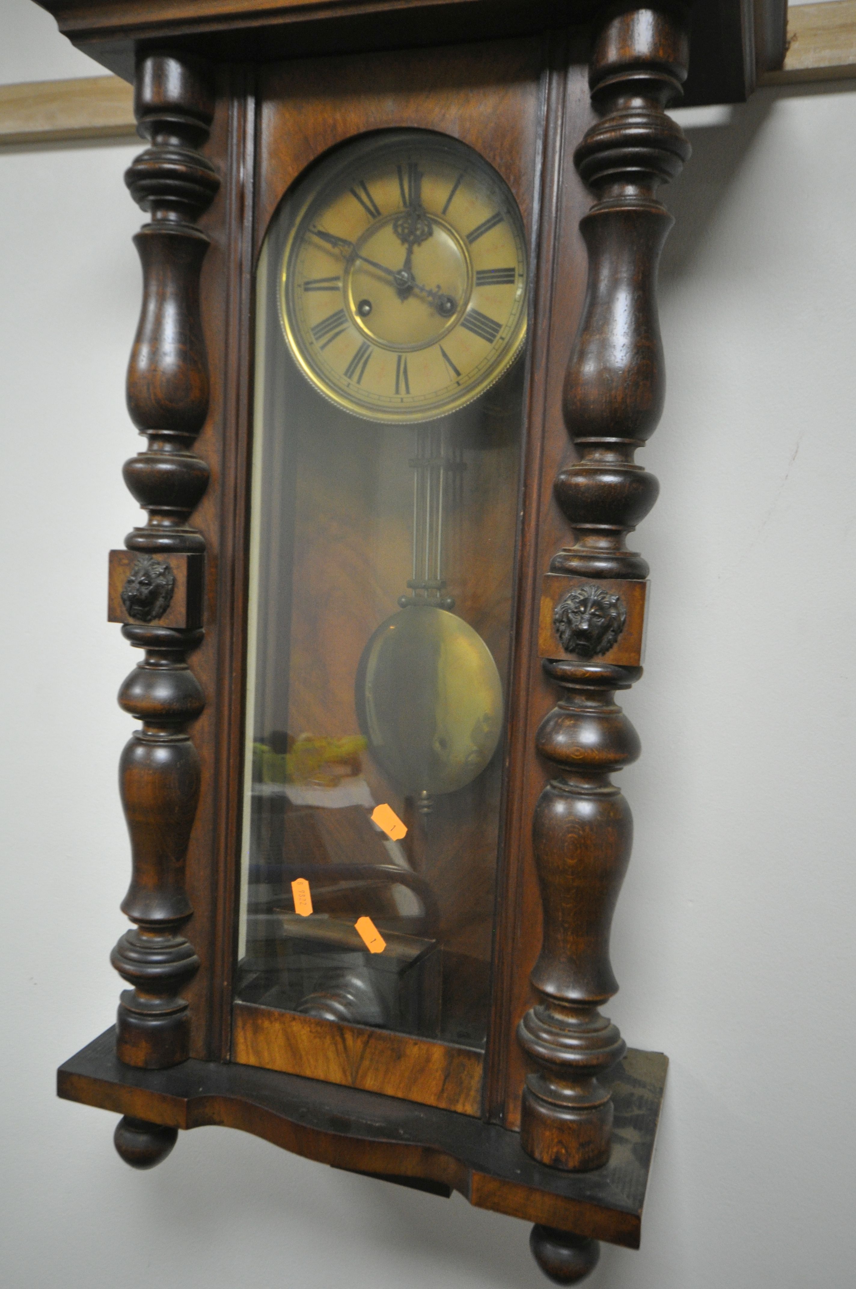A LATE 19TH CENTURY WALNUT VIENNA WALL CLOCK, with a resin horse pediment, turned pillars to the - Image 3 of 5