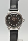 A VINTAGE MID 20TH CENTURY STAINLESS STEEL MANUAL WIND OMEGA WRISTWATCH, the matt black dial, with