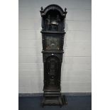 A HEAVILY CARVED EIGHT DAY LONGCASE CLOCK, the 11.5 inch brass and silvered dial singed John