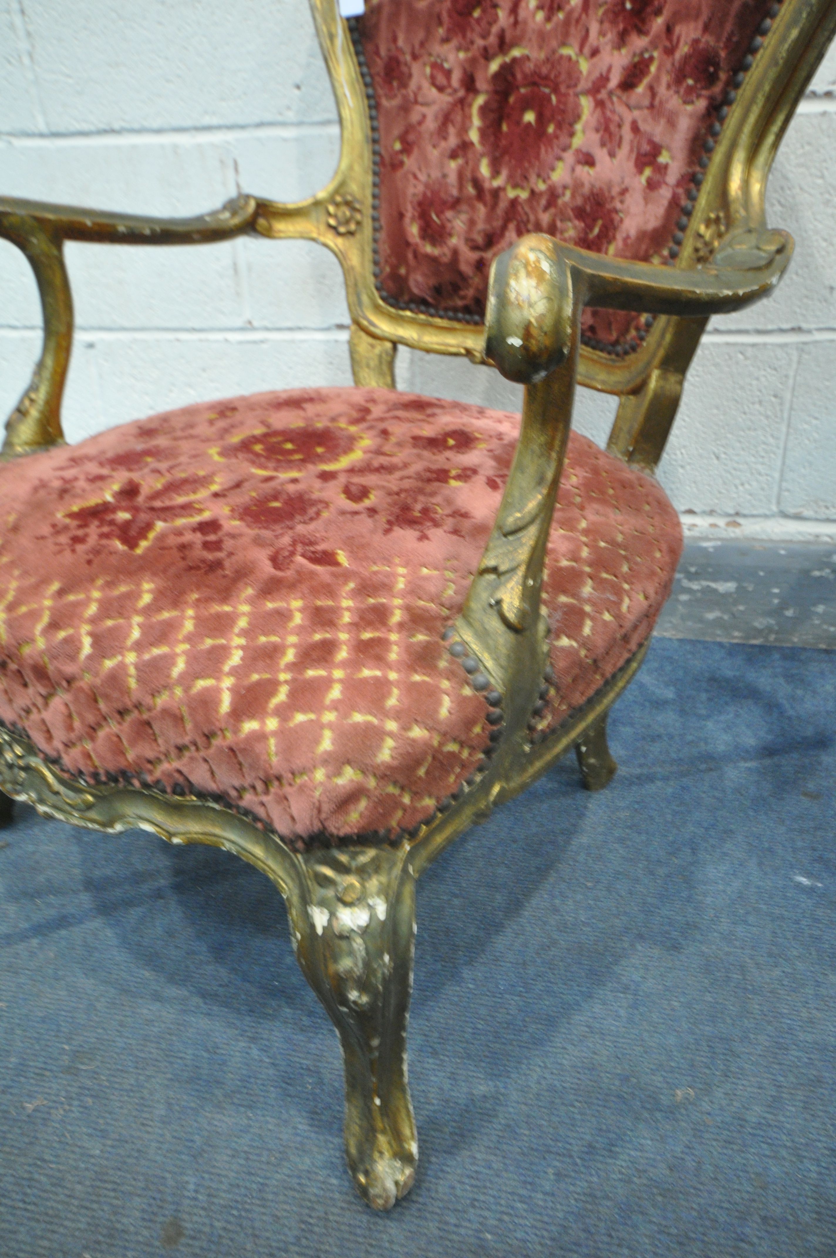A PAIR OF 19TH CENTURY OR EARLIER LOUIS XV GILT FRAMED OPEN ARMCHAIRS, covered with later - Image 5 of 8