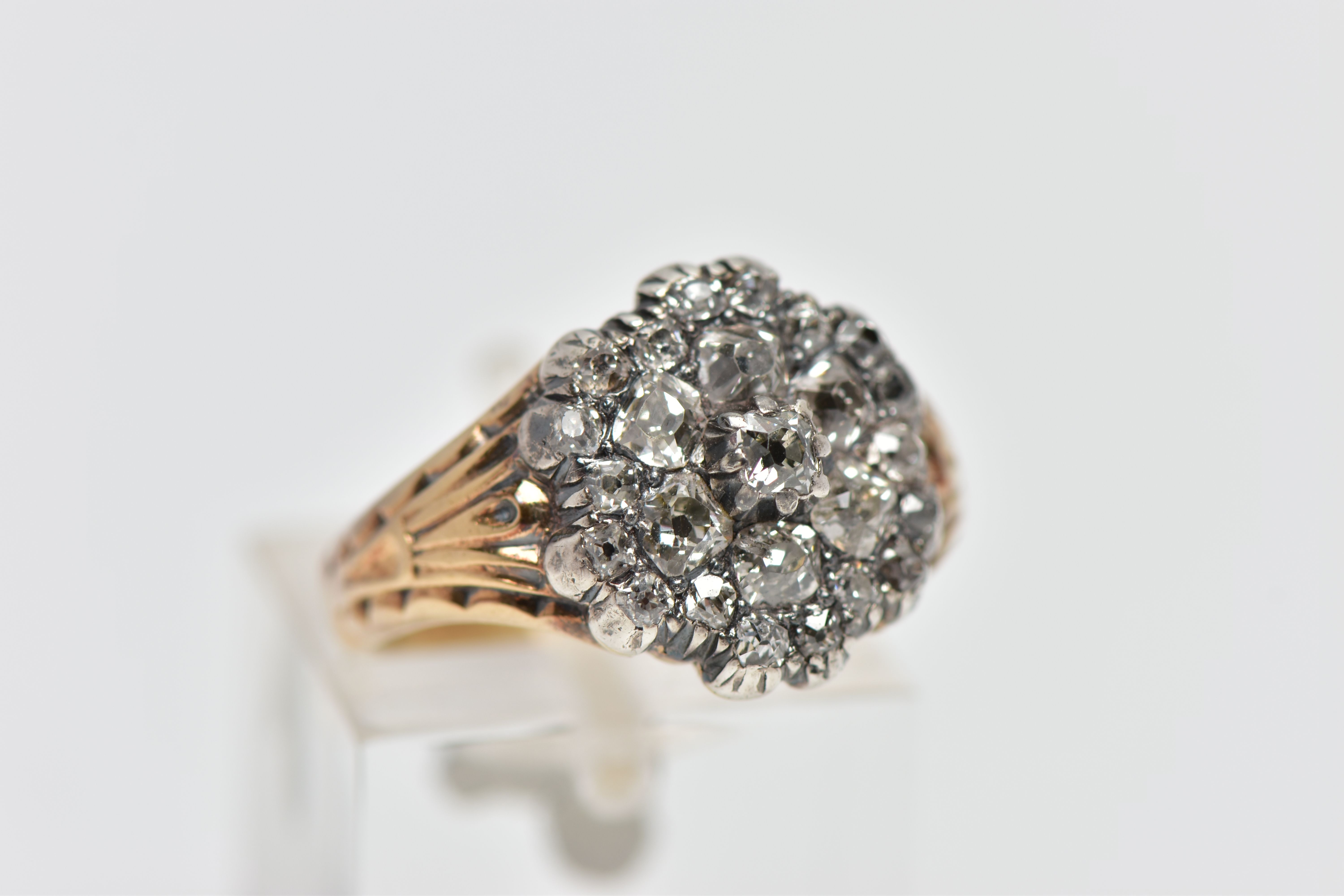 A GEORGIAN DIAMOND CLUSTER RING, set with a principal old mine cut diamond, measuring - Image 4 of 9