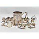 A GROUP OF SILVER, comprising a Victorian silver mug of conical form, cast foliate handle, the