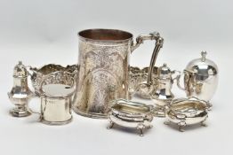 A GROUP OF SILVER, comprising a Victorian silver mug of conical form, cast foliate handle, the