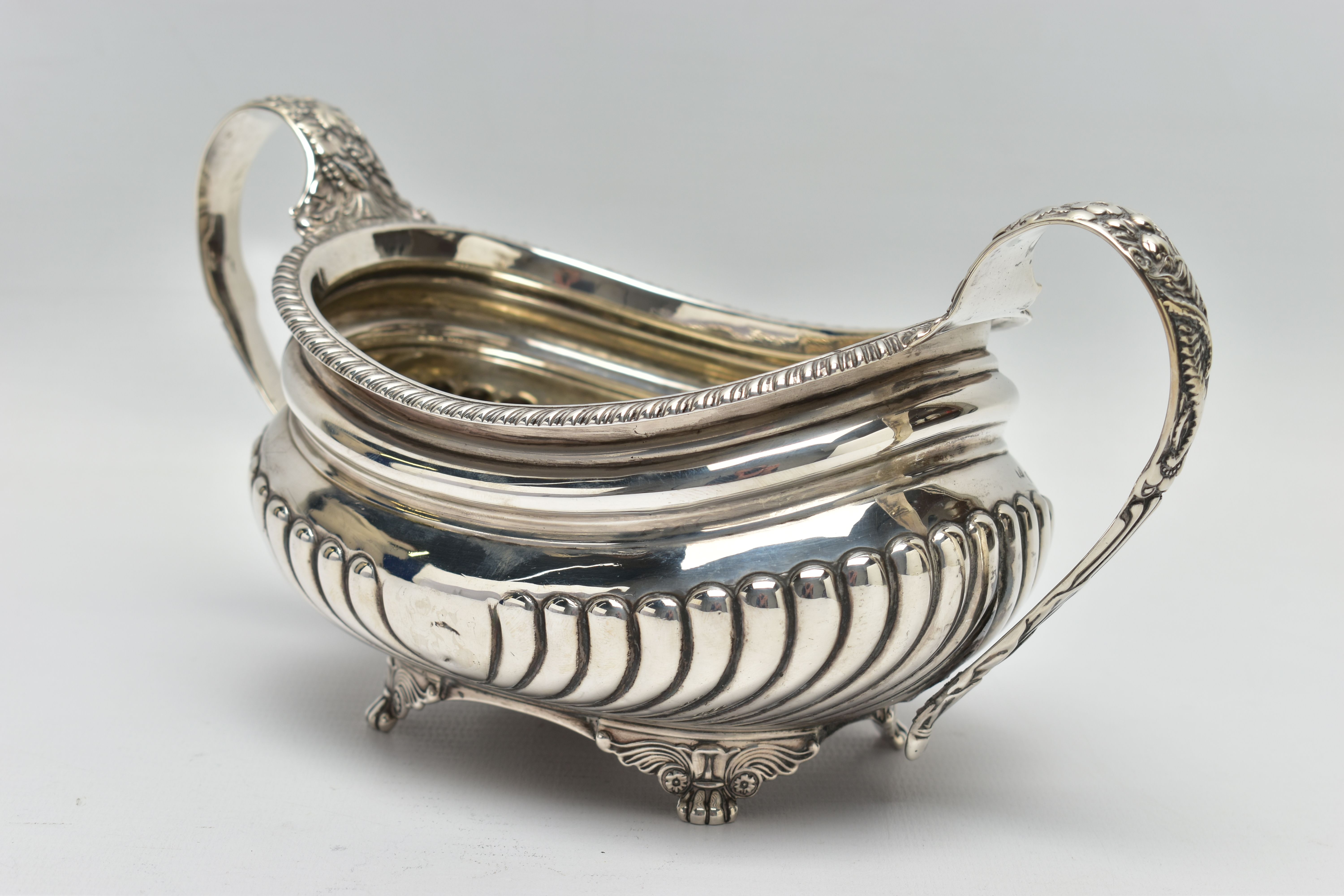 A GEORGE III SILVER TWIN HANDLED SUGAR BOWL OF OVAL FORM, gadrooned rim, cornucopia cast C scroll - Image 4 of 9