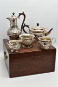 A LATE VICTORIAN OAK CASED FIVE PIECE SILVER TEA SERVICE BY Z BARRACLOUGH & SONS OF LEEDS, the