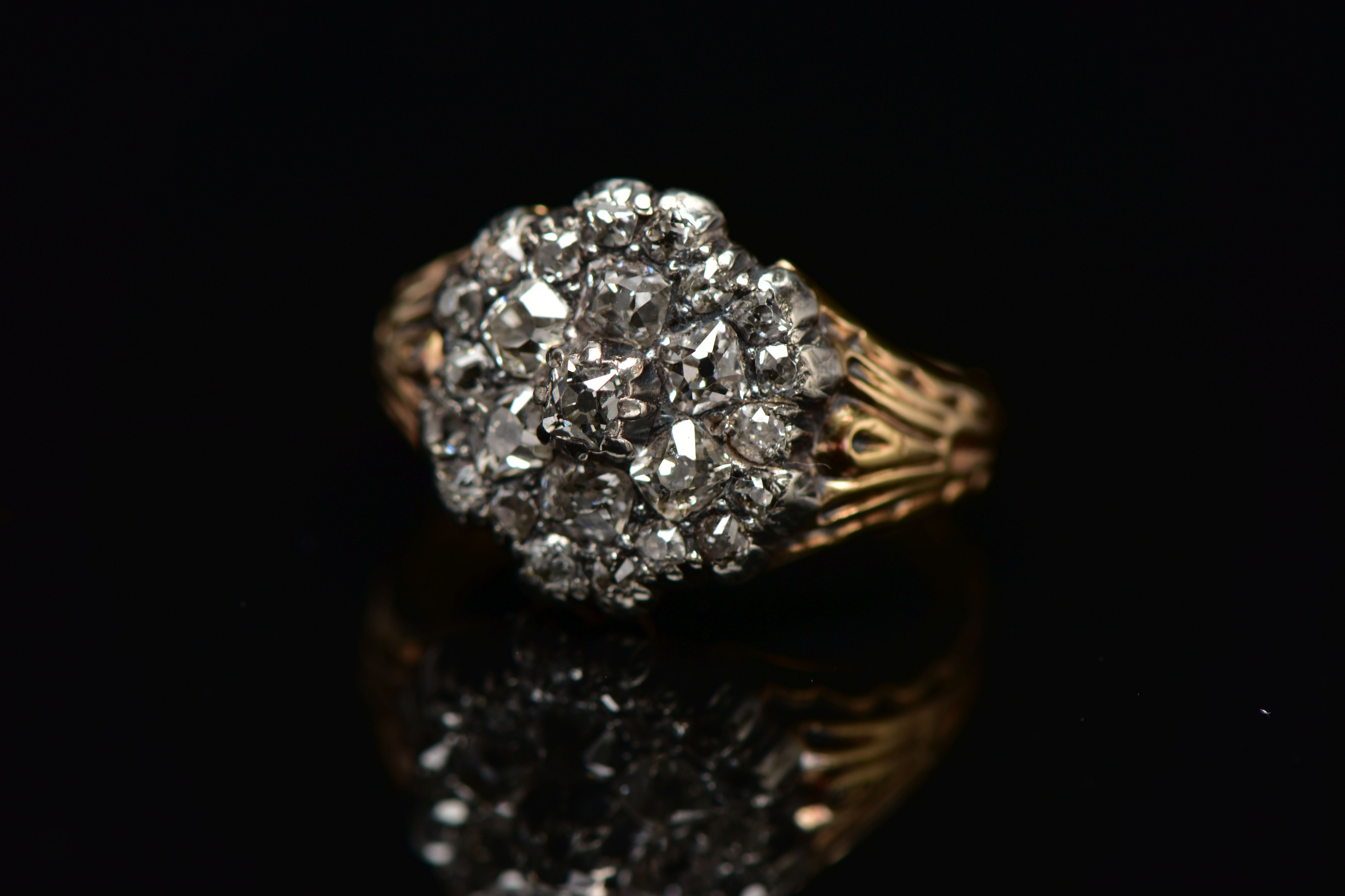 A GEORGIAN DIAMOND CLUSTER RING, set with a principal old mine cut diamond, measuring - Image 8 of 9