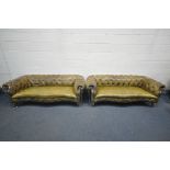 A PAIR OF EARLY 20TH CENTURY VICTORIAN STYLE OLIVE GREEN LEATHER SERPENTINE CHESTERFIELD SOFAS, on