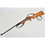 A .22” RELUM SPRING ACTION AIR RIFLE, serial number 26642, fitted with an under lever cocking arm,