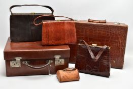 A VINTAGE CROCODILE SKIN SUITCASE BY DREW & SONS OF PICCADILLY CIRCUS, LONDON, the centre of the lid