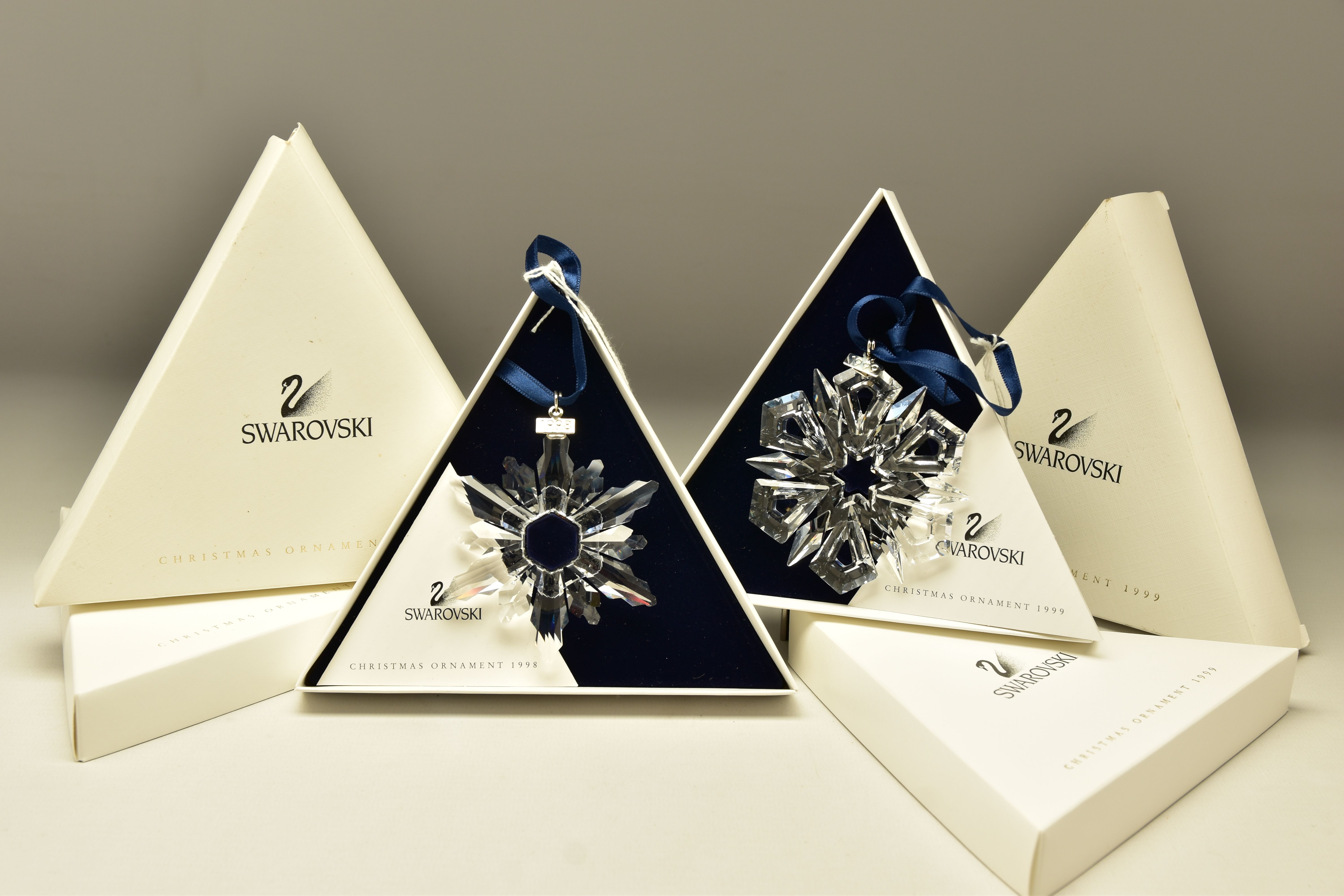 TWO BOXED SWAROVSKI ANNUAL CHRISTMAS ORNAMENTS 1998 AND 1999 (220037 and 235913) both designed by