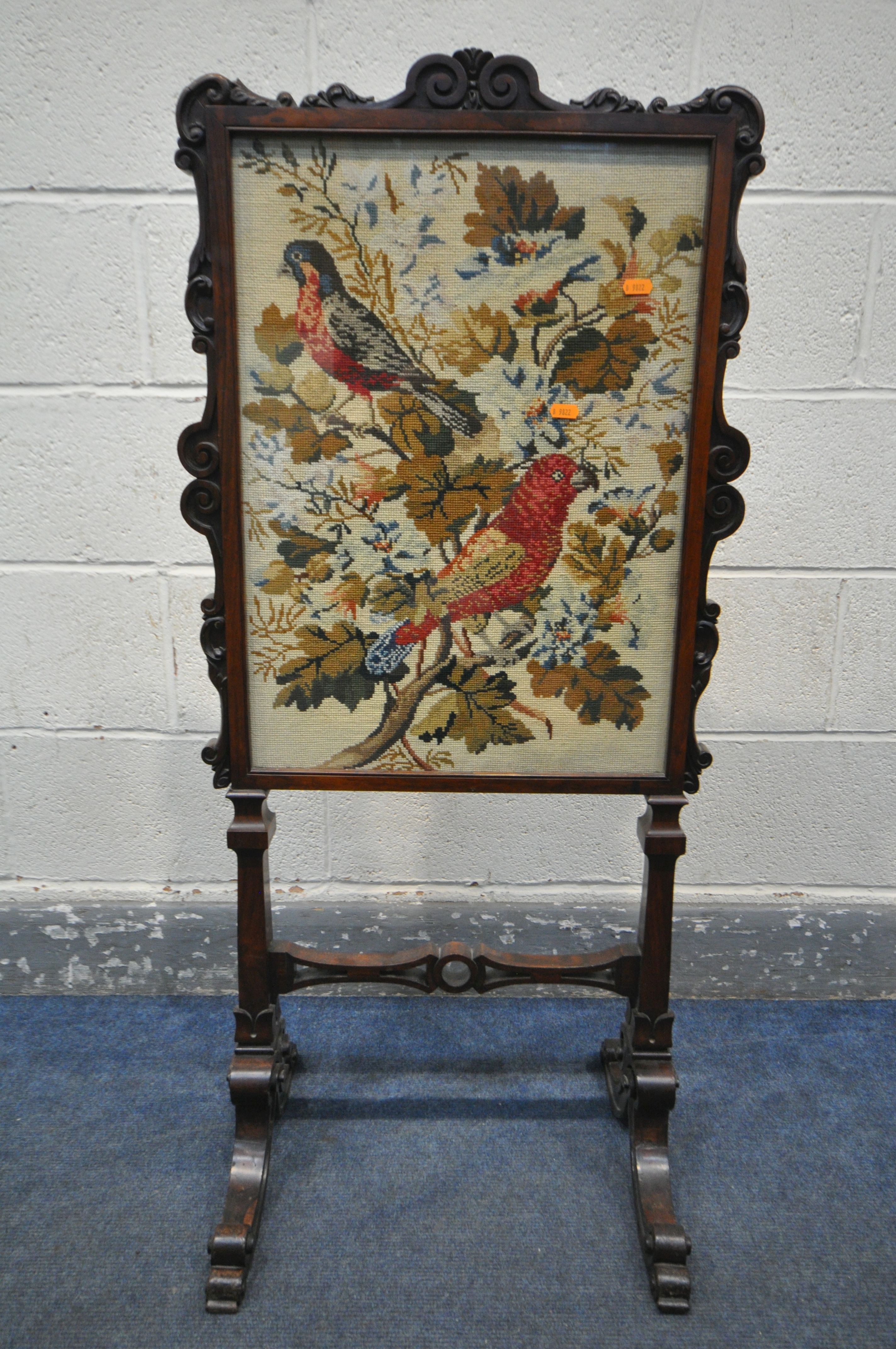 AN EARLY VICTORIAN ROSEWOOD FIRESCREEN, the frame with foliate scrolls, the glass panel enclosing - Image 2 of 5