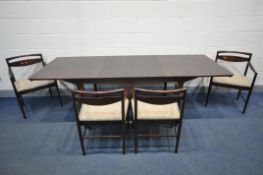 A MCINTOSH ROSEWOOD 1970'S EXTENDING DINING TABLE, with two additional fold out leaves, on tapered