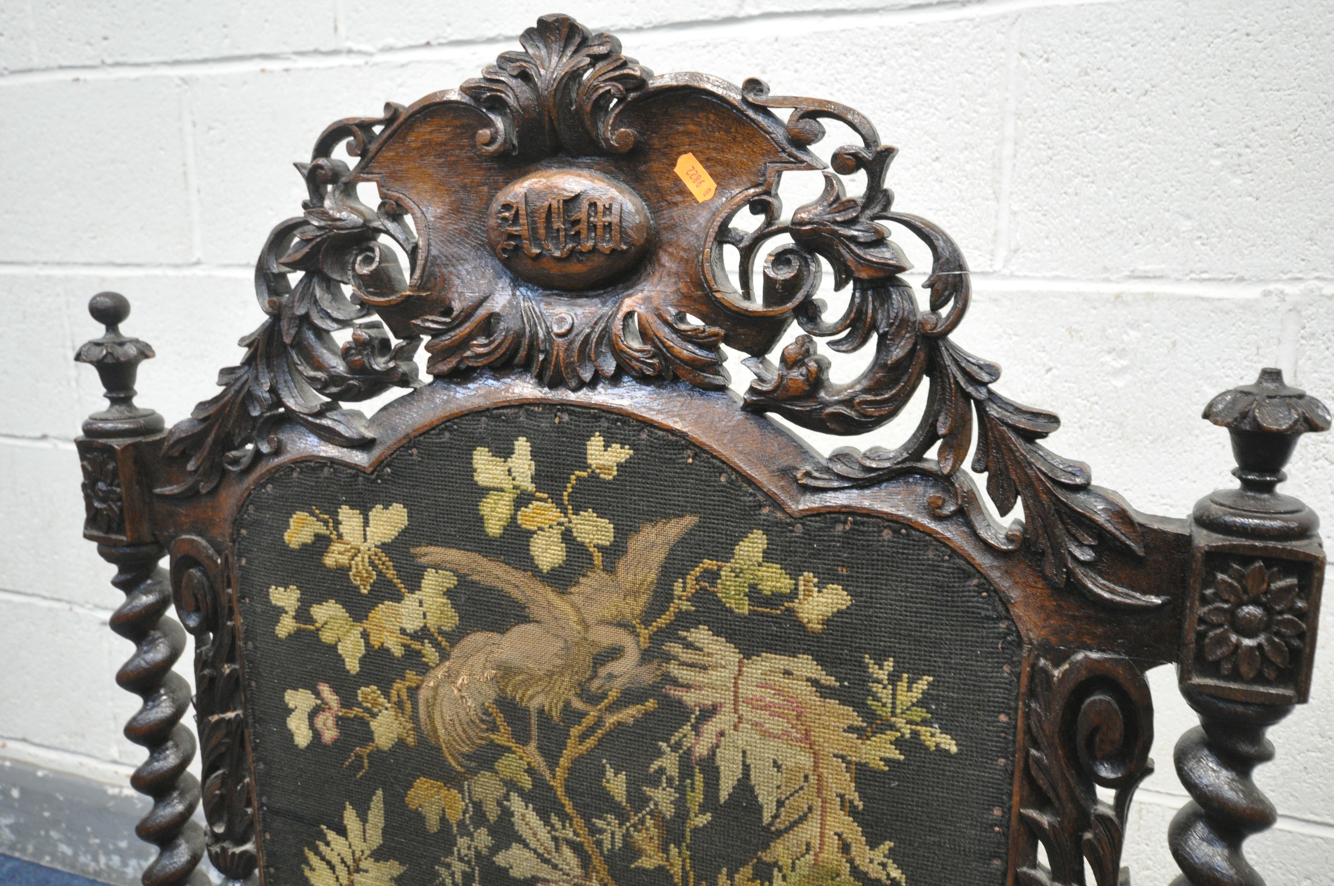 A VICTORIAN CARVED OAK FIRESCREEN, the detailed foliate decorated frame, central lettering reading - Image 3 of 6