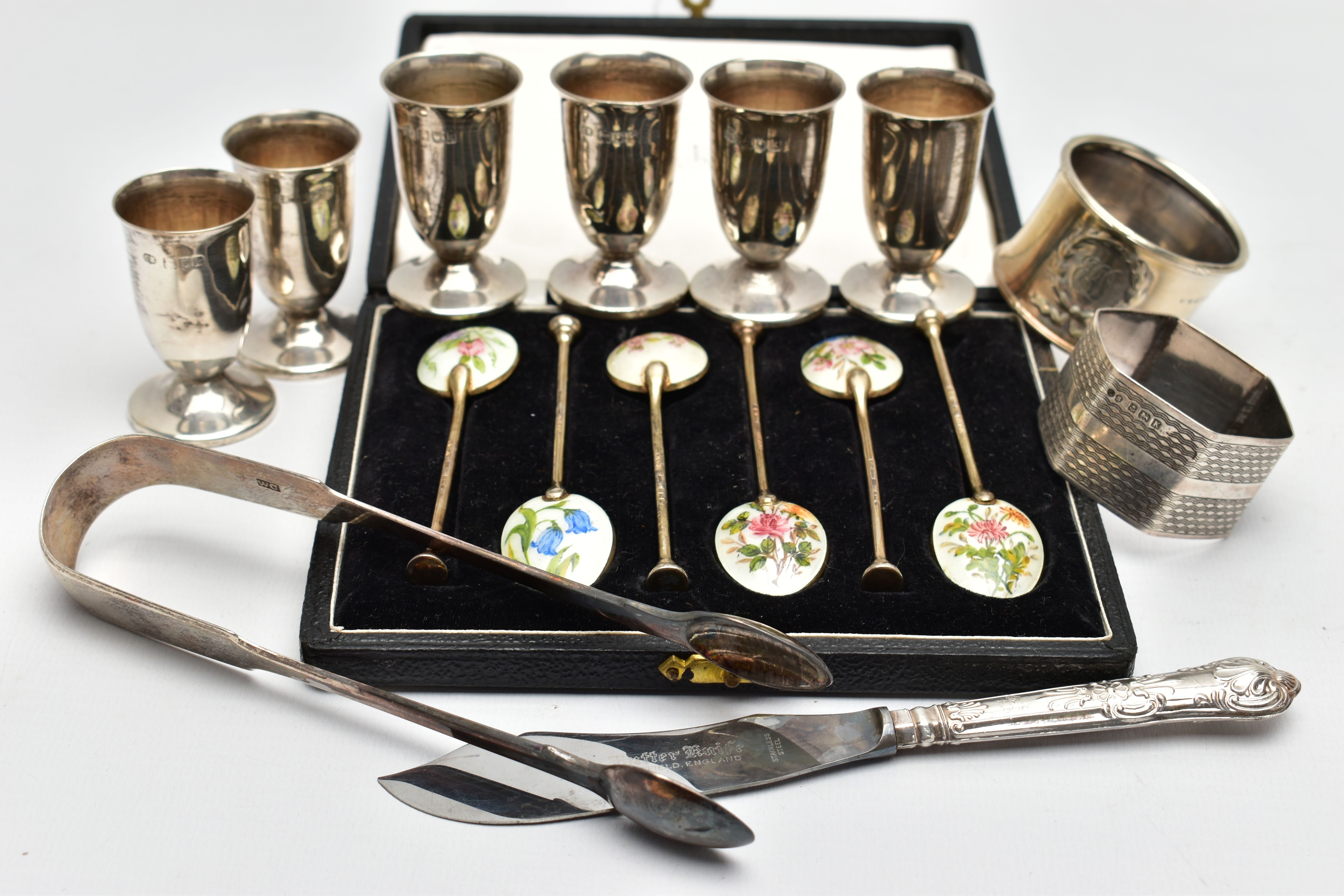 A CASED SET OF SIX ELIZABETH II SILVER GILT AND ENAMEL COFFEE SPOONS AND TEN OTHER SILVER ITEMS,