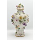 A LATE 19TH CENTURY CONTINENTAL PORCELAIN SCHNEEBALLEN VASE AND COVER, possibly Paris, the domed