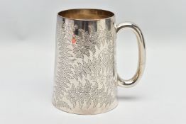 A VICTORIAN SILVER TANKARD OF CONICAL FORM, C scroll handle, the body engraved with ferns