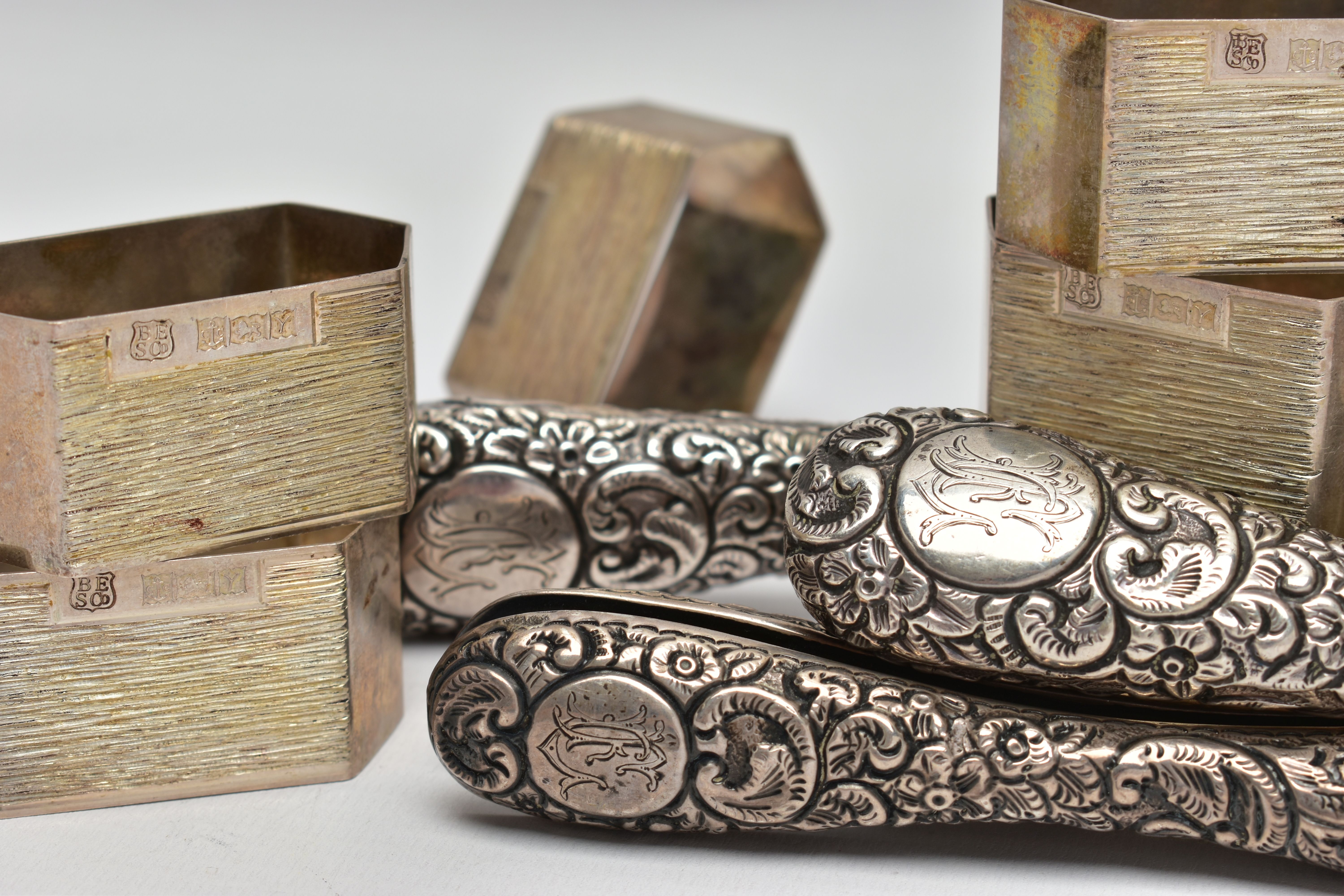 A SET OF SIX ELIZABETH II SILVER SHAPED HEXAGONAL NAPKIN RINGS, bark effect decoration, makers - Image 7 of 7