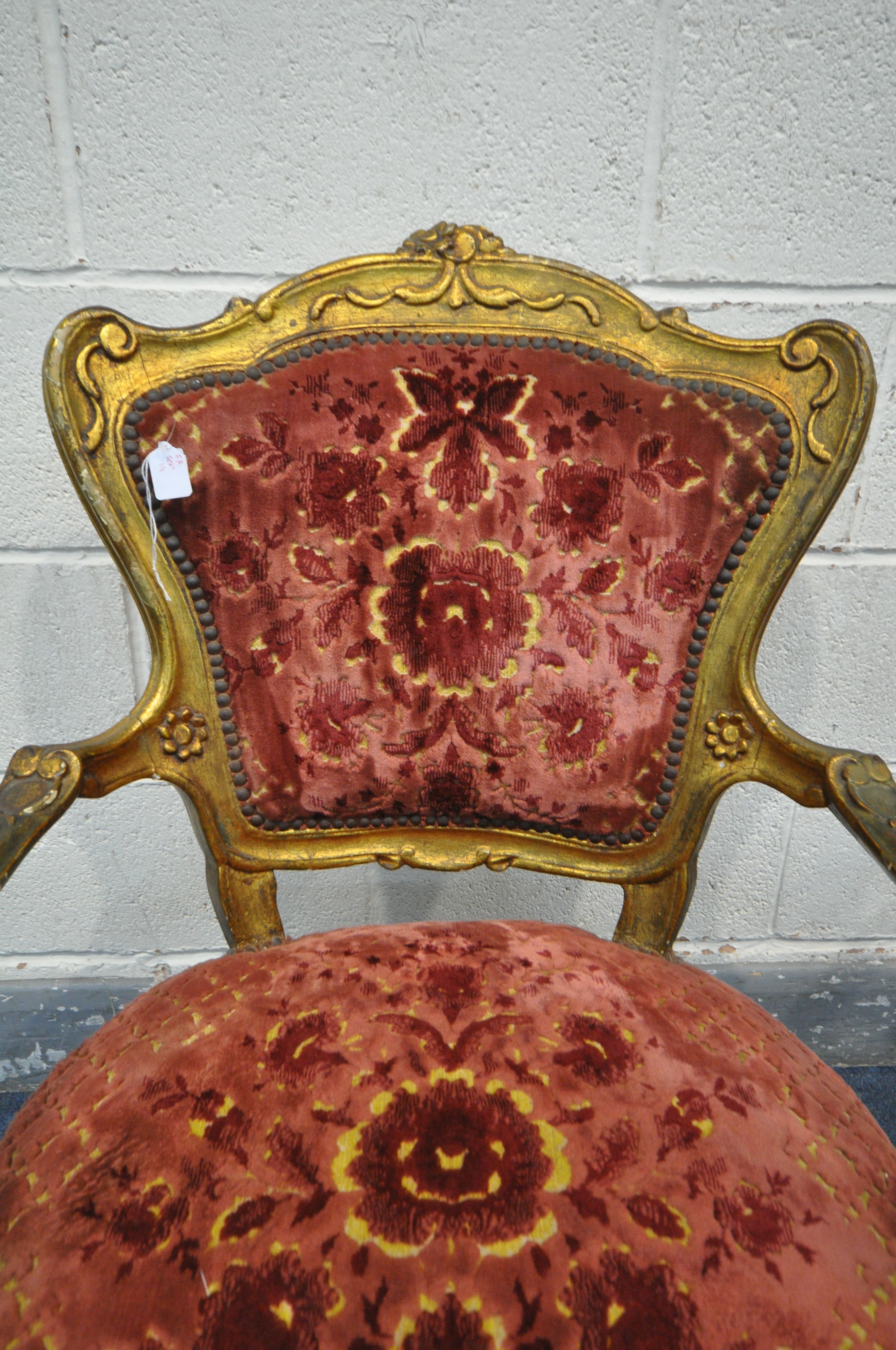 A PAIR OF 19TH CENTURY OR EARLIER LOUIS XV GILT FRAMED OPEN ARMCHAIRS, covered with later - Image 4 of 8