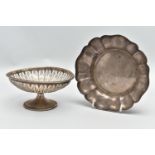 AN ELIZABETH II SILVER DISH OF WAVY OUTLINE AND A GEORGE V PIERCED SILVER PEDESTAL DISH, the wavy