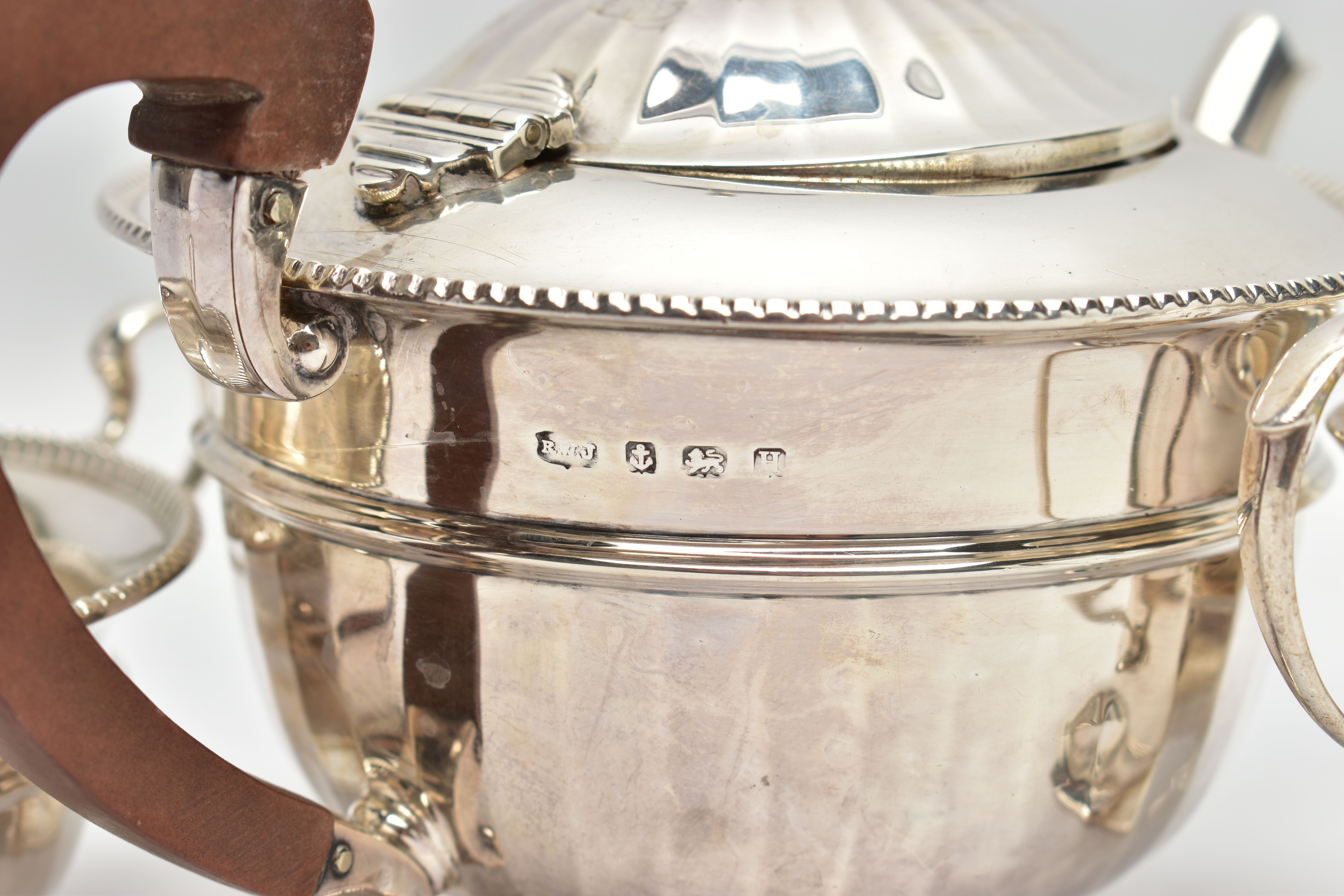 A GEORGE V SILVER THREE PIECE TEA SERVICE OF CIRCULAR PANELLED FORM, reeded rims, S scroll - Image 5 of 9