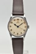 A VINTAGE STAINLESS STEEL MANUAL WIND OMEGA WRISTWATCH, the cream dial, with black Arabic