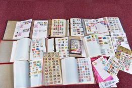 LARGE COLLECTION OF WORLDWIDE STAMPS, in 8 large binders both mint and used