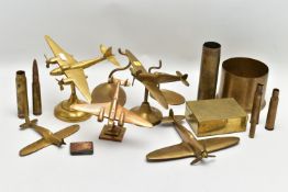 A BOX CONTAINING VARIOUS BRASS MILITARY ITEMS AS FOLLOWS, five models of British Fighter and