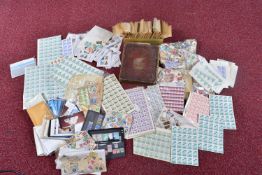 LARGE ACCUMULATION OF STAMPS IN BOX, mostly in packets, but we note a remaindered very old Senf