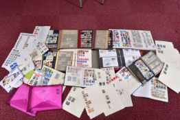 STAMP COLLECTION IN TWO FRUIT BOXES IN ALBUMS, and loose, general ranges with an emphasis on