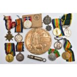 A FAMILY ARCHIVE OF THREE GROUPS OF MEDALS AS FOLLOWS, 1914-15 Star, British War & Victory medals,