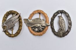 THREE POST WW2 GERMAN COMBAT BADGES, these are the variants that could be worn by Veterans etc