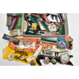 A BOX OF ASSORTED MILITARIA, to include cloth and metal Insignia, German, US, Eastern Bloc, many are